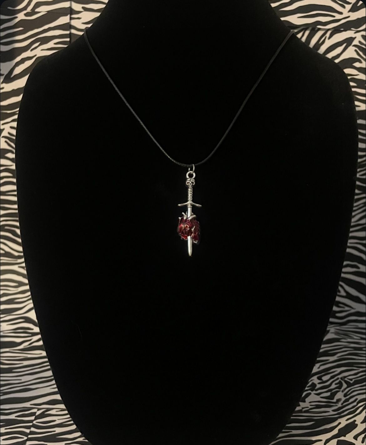 realistic heart dagger necklace
